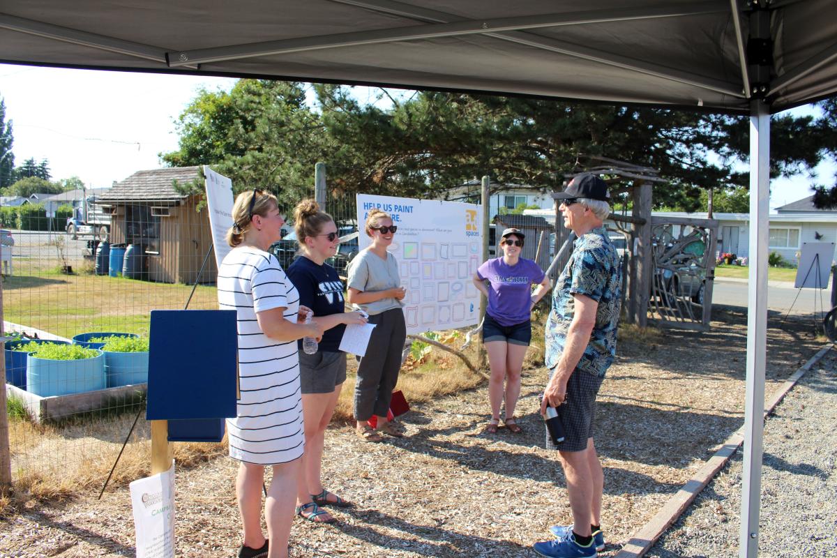 The MABRRI team discusses the project with community members.