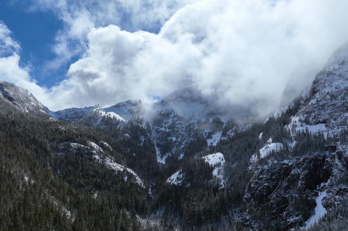 Arial shot of Mount Arrowsmith in the clouds